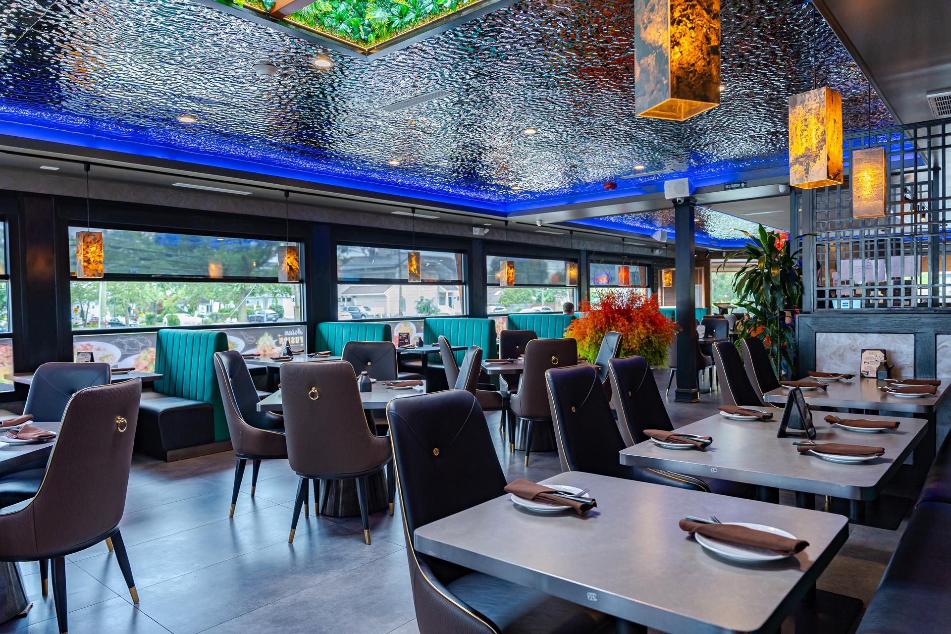 Cherry Amber dining room with booth seating and amber pendant lights